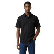 Calvin Klein Jeans Chemise homme noire à manches courtes, fermeture boutonnée, poche poitrine et logo minimaliste