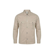 Chemise beige à manches longues boutonnée Calvin Klein Jeans Chemise pour homme avec deux poches poitrine et un discret écusson de marque sur la poche gauche