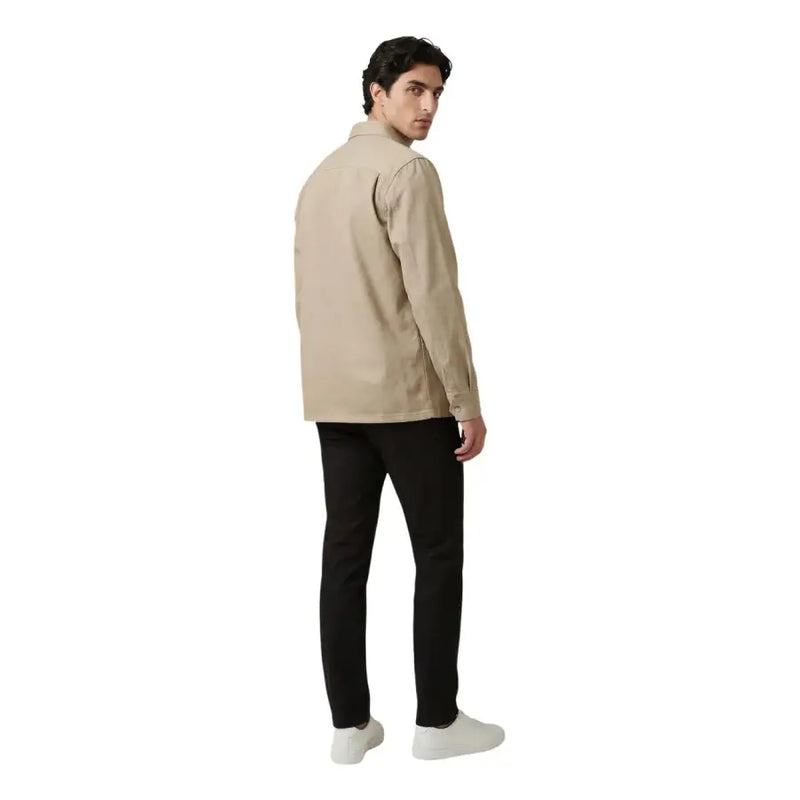 Veste en coton beige avec col classique et poignets boutonnés par Calvin Klein Jeans pour hommes dans un style chemise