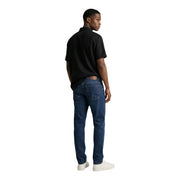 Jean en denim bleu foncé avec une coupe classique à cinq poches et un délavage délavé Calvin Klein Jeans chemise pour homme