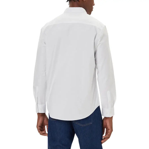 Calvin Klein Jeans Chemise blanche pour homme, manches longues, boutonnée, col classique et poignets soigneusement repliés