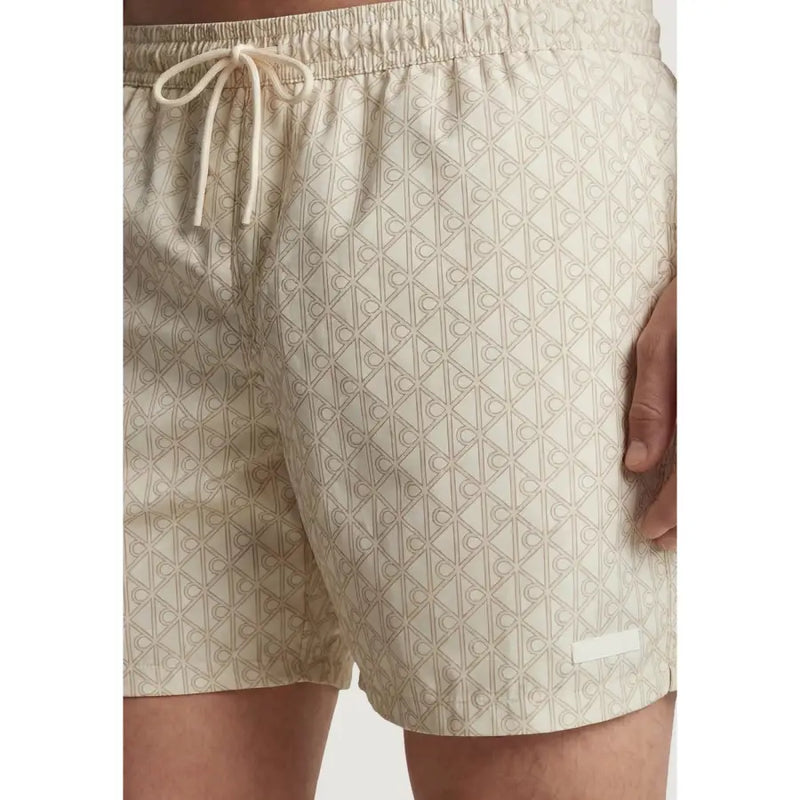 Calvin Klein Jeans men swimwear beige swim trunks with subtle geometric pattern and matching drawstring waistband