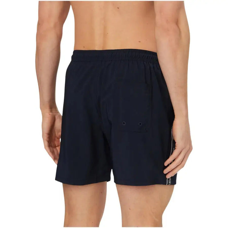 Calvin Klein Jeans men swimwear dark navy blue swim trunks with elastic waistband and subtle side stripe