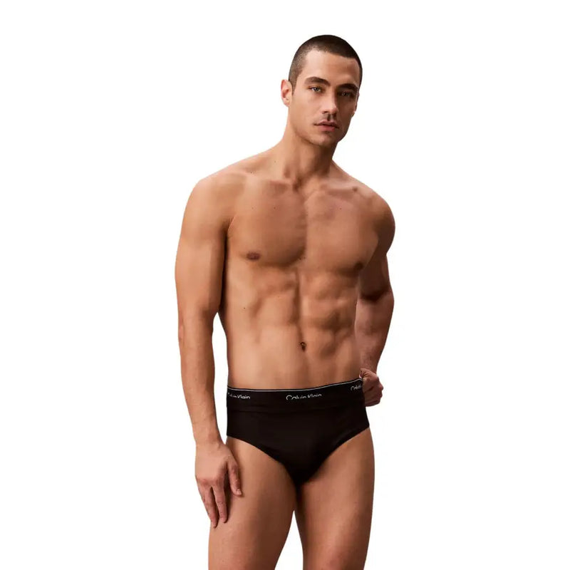 Calvin klein jeans men swimwear black briefs with subtle white logo trim designed for swimming and comfort