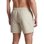 Beige calvin klein jeans men swimwear swim trunks with a subtle repeating geometric pattern suitable for swimming