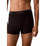 Black Calvin Klein Jeans men swimwear boxer briefs with white logo waistband designed for swimming comfort