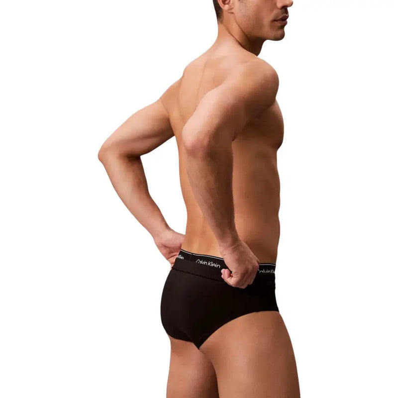 Calvin klein jeans men swimwear black briefs with white logo waistband designed for comfort and style