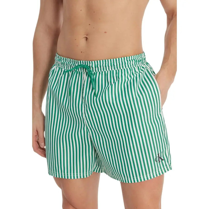Calvin Klein Jeans men swimwear green and white vertically striped swim trunks with matching drawstring waistband