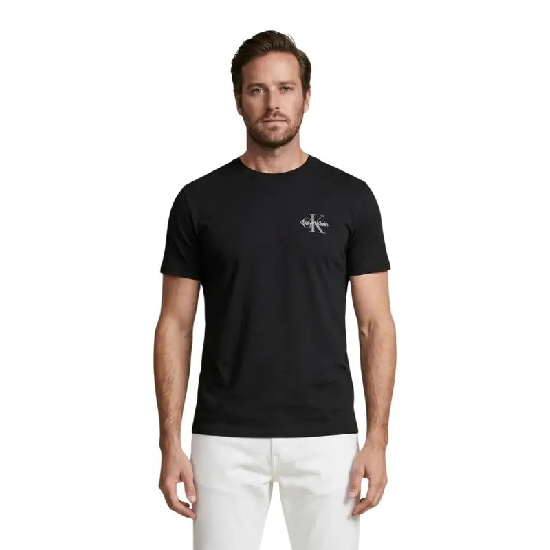 Calvin Klein Jeans coton noir pour hommes t-shirt avec un logo blanc discret sur la poitrine gauche pour une tenue décontractée