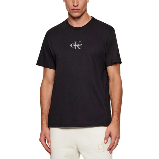 Calvin Klein Jeans men t-shirt in black cotton with a white Calvin Klein logo on the chest front