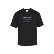 Noir Calvin Klein Jeans T-shirt homme en coton à manches courtes avec logo blanc imprimé, idéal pour une tenue décontractée.
