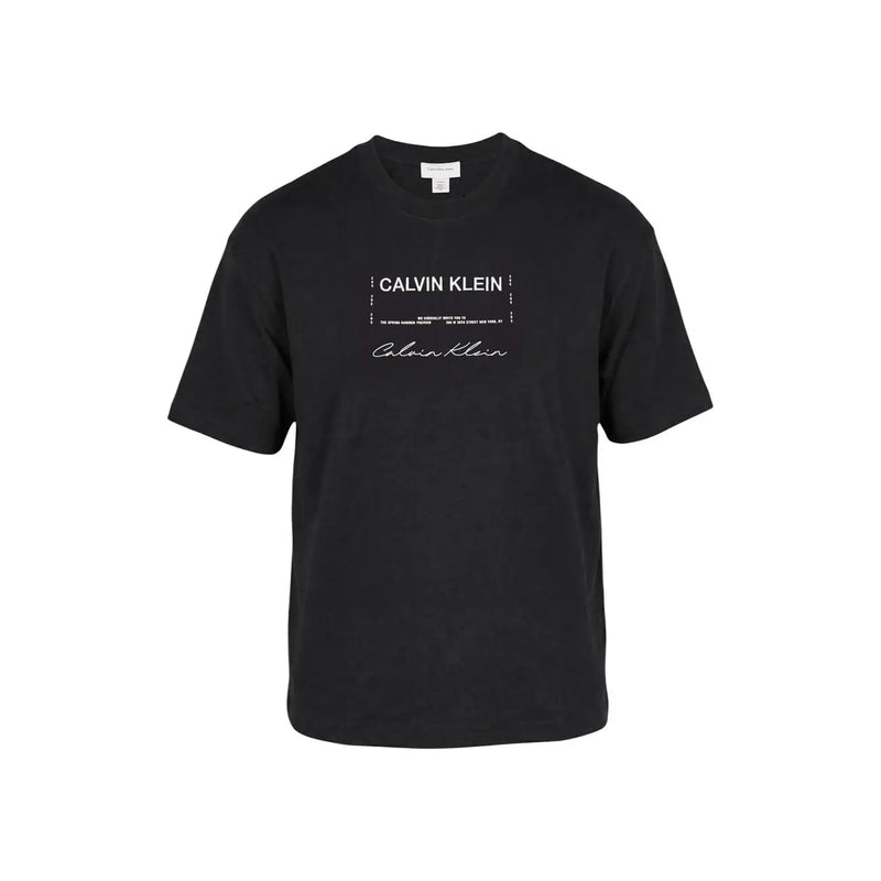 Noir Calvin Klein Jeans T-shirt homme en coton à manches courtes avec logo blanc imprimé, idéal pour une tenue décontractée.