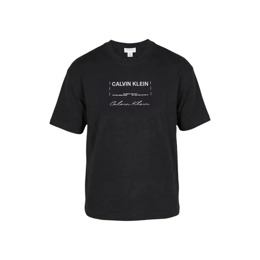 Noir Calvin Klein Jeans T-shirt homme en coton à manches courtes avec logo blanc imprimé, idéal pour une tenue décontractée.