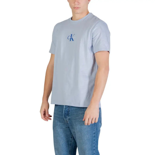 Light blue Calvin Klein Jeans men t shirt made of cotton with small embroidered logo and round neck design