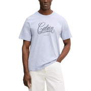 Light blue calvin klein jeans men t shirt in cotton with round neck and black cursive calvin logo and brand name below