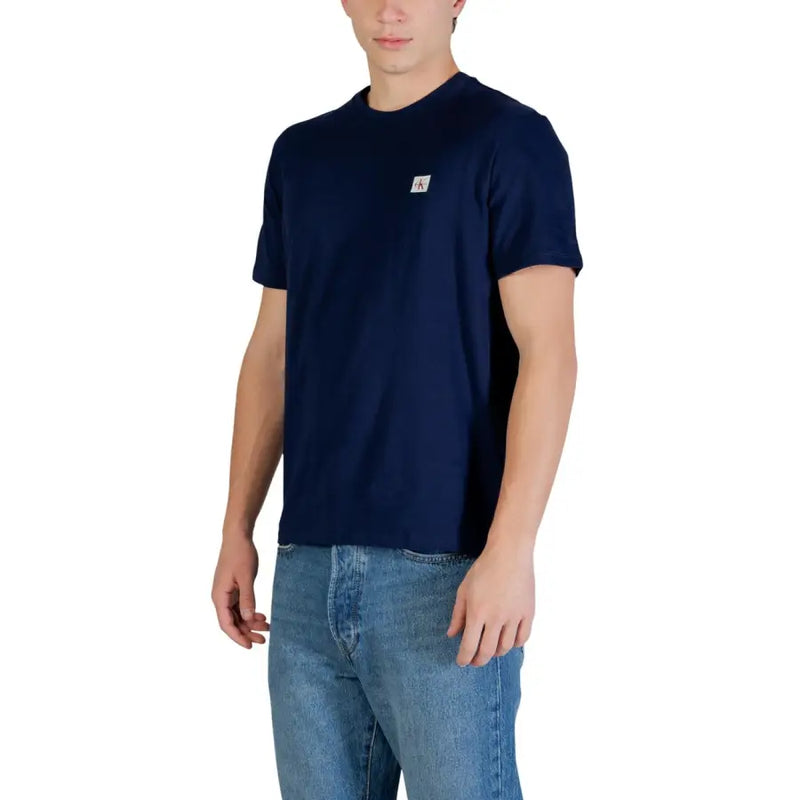 Navy blue Calvin Klein Jeans men t shirt made of cotton with a small white logo patch on the left chest