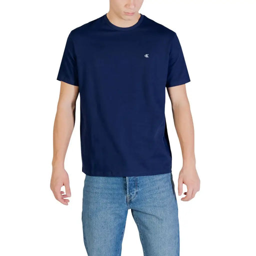 Navy blue Calvin Klein Jeans men t shirt with small white logo on left chest made of 100% cotton monogram fabric