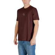 Calvin Klein Jeans men t shirt brown cotton round neck with subtle embroidered ck logo on the chest