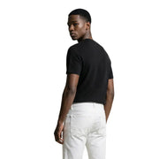 Calvin Klein Jeans hommes t-shirt avec un design à manches courtes texturé noir pour une tenue décontractée