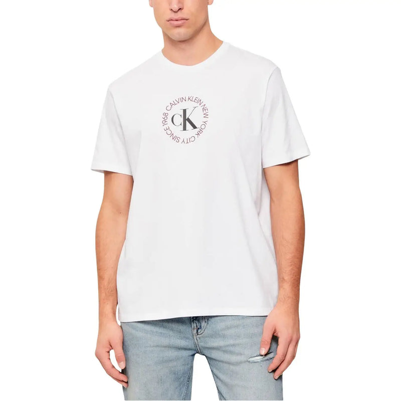 White cotton Calvin Klein Jeans men t-shirt featuring a circular logo with black and gray text on the front