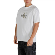 White Calvin Klein Jeans men t-shirt featuring a silver CK logo and brand name on the chest