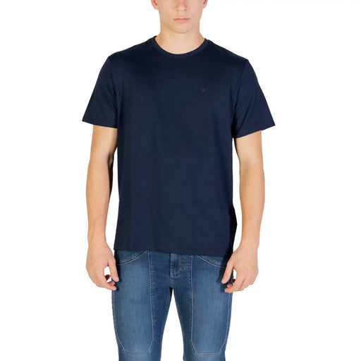 Navy blue cotton crew neck t-shirt with subtle logo on left chest by Calvin Klein Jeans for men