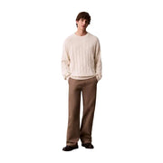 Pull en coton à torsades couleur crème, col rond classique et manches longues de Calvin Klein Jeans collection homme
