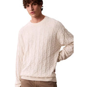 Pull en maille torsadée géométrique couleur crème en coton, orné d'un motif losange texturé et de poignets côtelés, signé Calvin Klein Jeans