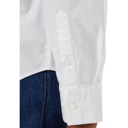 Calvin klein jeans men white button-down shirt cuff with neatly stitched seams and matching buttons