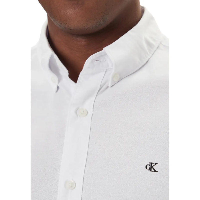 Calvin Klein Jeans men shirt in white with subtle textured weave and black embroidered logo on the left chest