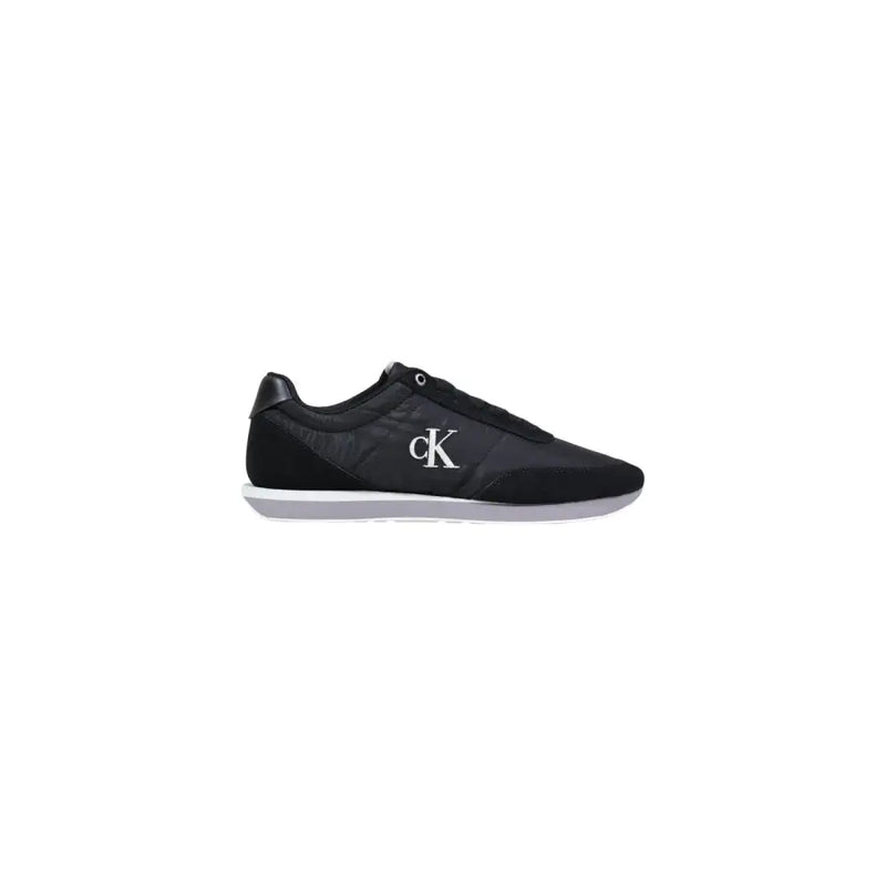 Baskets montantes Calvin Klein Jeans noires pour homme, blanches, en polyester, avec une tige matelassée élégante et un logo blanc sur le côté.