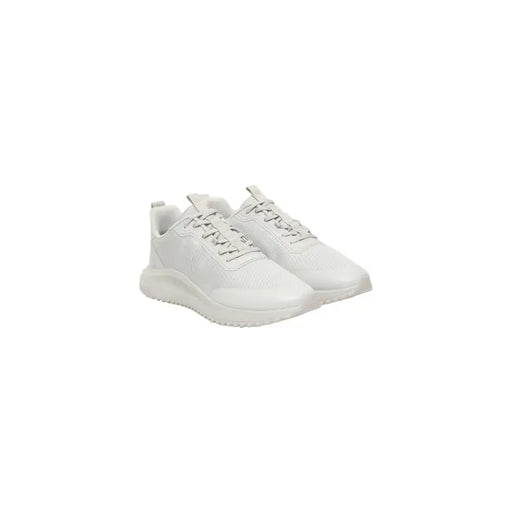 Calvin Klein Jeans Baskets blanches pour homme, style sport, en maille blanche, au design minimaliste et élégant, avec lacets assortis.