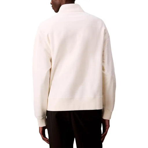 Calvin Klein Jeans Sweat-shirt à col roulé zippé blanc pour homme, en mélange de coton doux couleur crème, avec col montant et poignets côtelés.