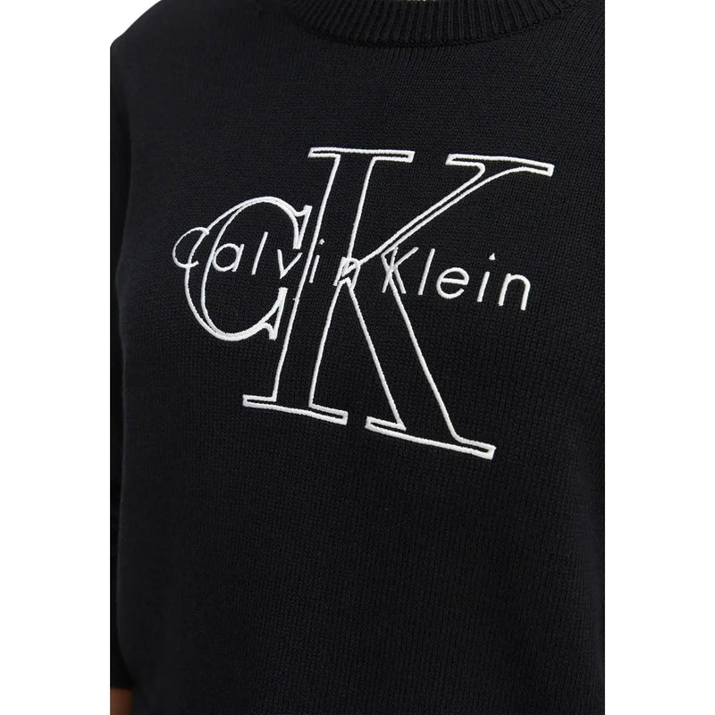 Pull en maille de coton noir Calvin Klein pour femme, orné d'un logo CK brodé en blanc sur le devant.