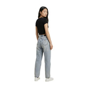 Light-wash denim jeans with high-rise straight-leg cut and classic back pockets paired with Calvin Klein black cotton t shirt