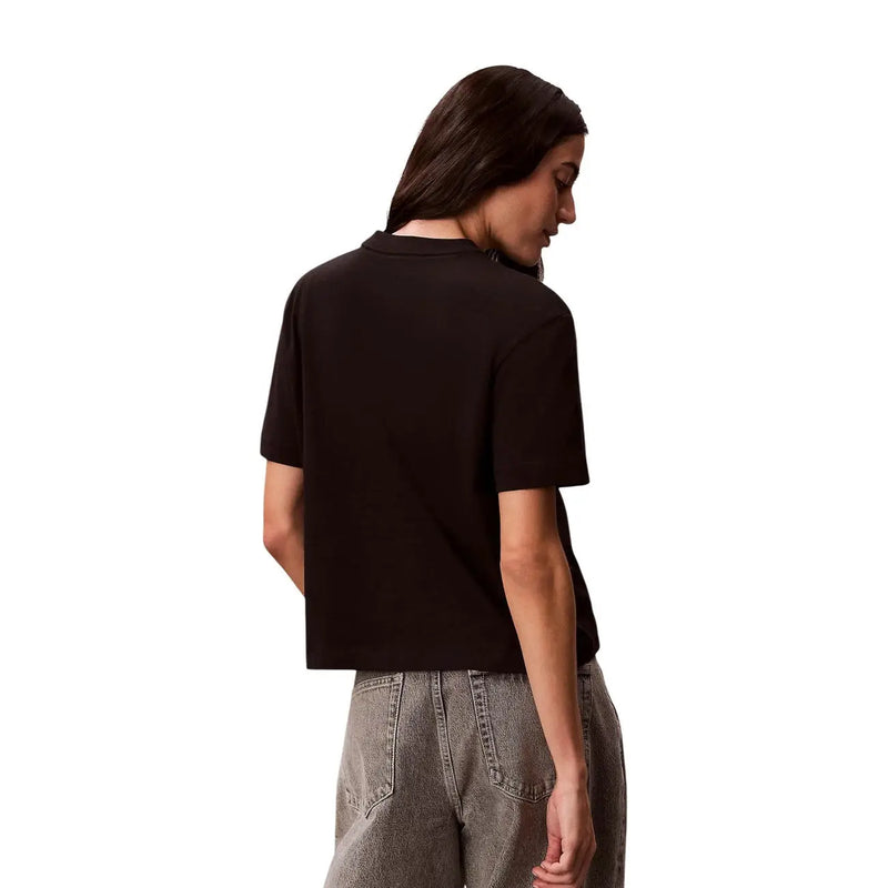Calvin Klein Jeans T-shirt court à manches courtes et col rond en coton noir pour femme, vue de face