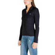 Calvin Klein Jeans Polo noir à manches longues pour femme avec logo discret sur la poitrine