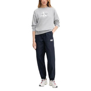 Calvin Klein gray sweatshirt with white CK logo and navy joggers