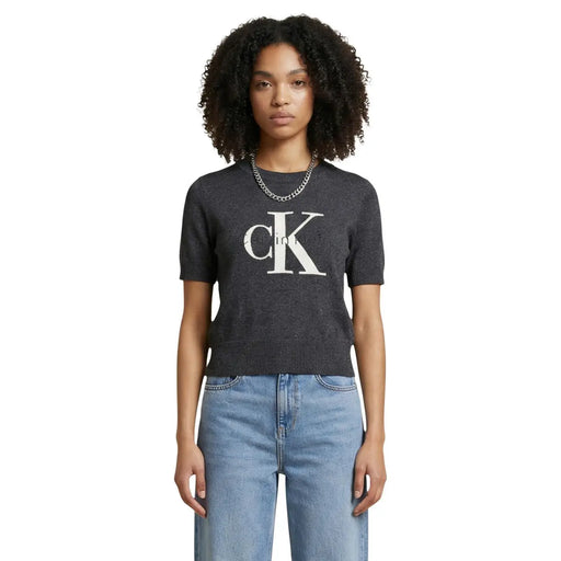 Dark gray short-sleeved cotton knit top with white ck logo across the chest by Calvin Klein Jeans women