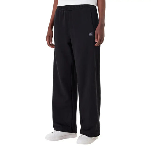 Calvin Klein Pantalon de survêtement noir en coton à jambes larges avec écusson logo