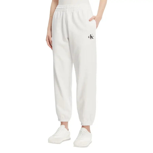 Calvin Klein Pantalon de jogging blanc avec logo noir sur la cuisse et pantalon en coton bleu clair