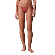 Calvin Klein Jeans women orange striped coral-colored minimalist bikini bottom with adjustable side ties front view