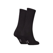 Chaussettes montantes noires côtelées en mélange de coton, avec un logo blanc discret près du talon, de la ligne de sous-vêtements femme Calvin Klein Jeans.
