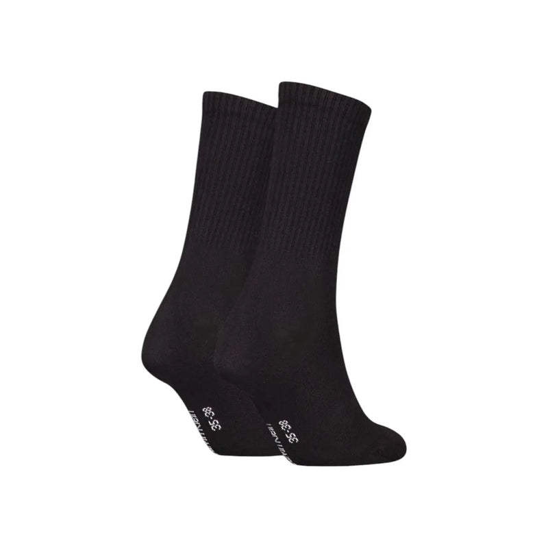 Chaussettes montantes noires côtelées en mélange de coton, avec un logo blanc discret près du talon, de la ligne de sous-vêtements femme Calvin Klein Jeans.