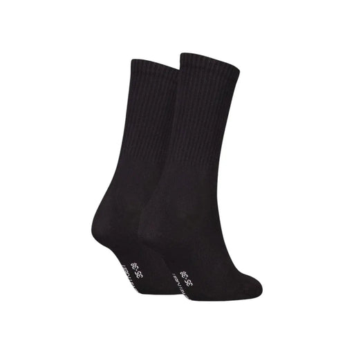 Chaussettes montantes noires côtelées en mélange de coton, avec un logo blanc discret près du talon, de la ligne de sous-vêtements femme Calvin Klein Jeans.