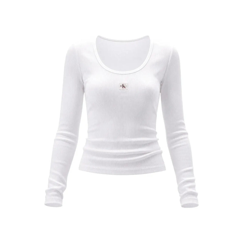 T-shirt blanc côtelé à manches longues en coton lycra top Pour femmes, avec un discret écusson Calvin Klein sur la poitrine