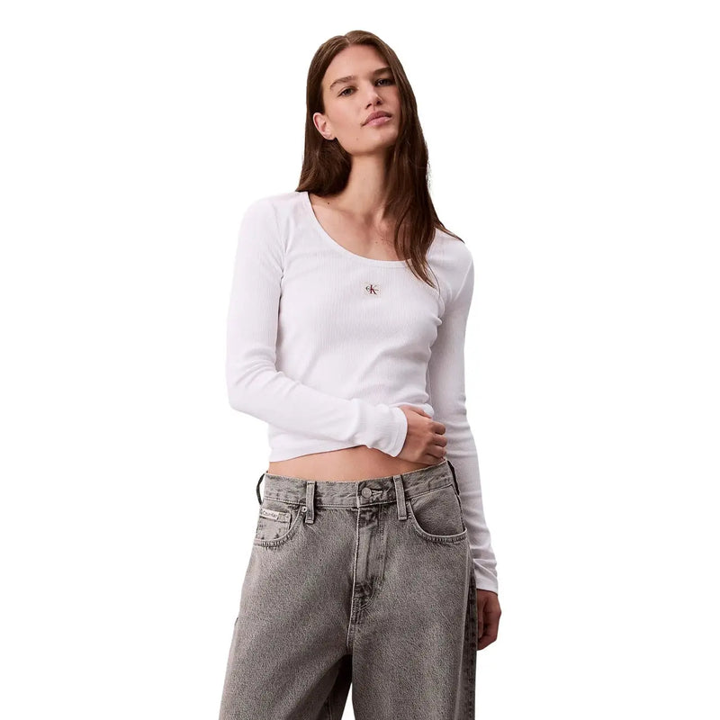 crop top blanc en coton lycra à manches longues top avec de petites broderies Calvin Klein logo sur la poitrine pour femmes