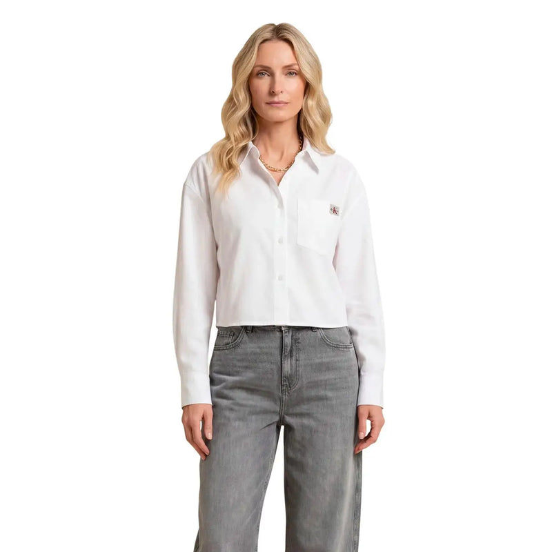 White cotton long-sleeved button-up shirt with chest pocket featuring calvin klein logo from Calvin Klein Jeans women collection
