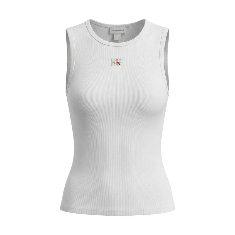 Calvin Klein Jeans débardeur blanc sans manches à col rond côtelé pour femme top avec un écusson logo rouge et noir sur la poitrine