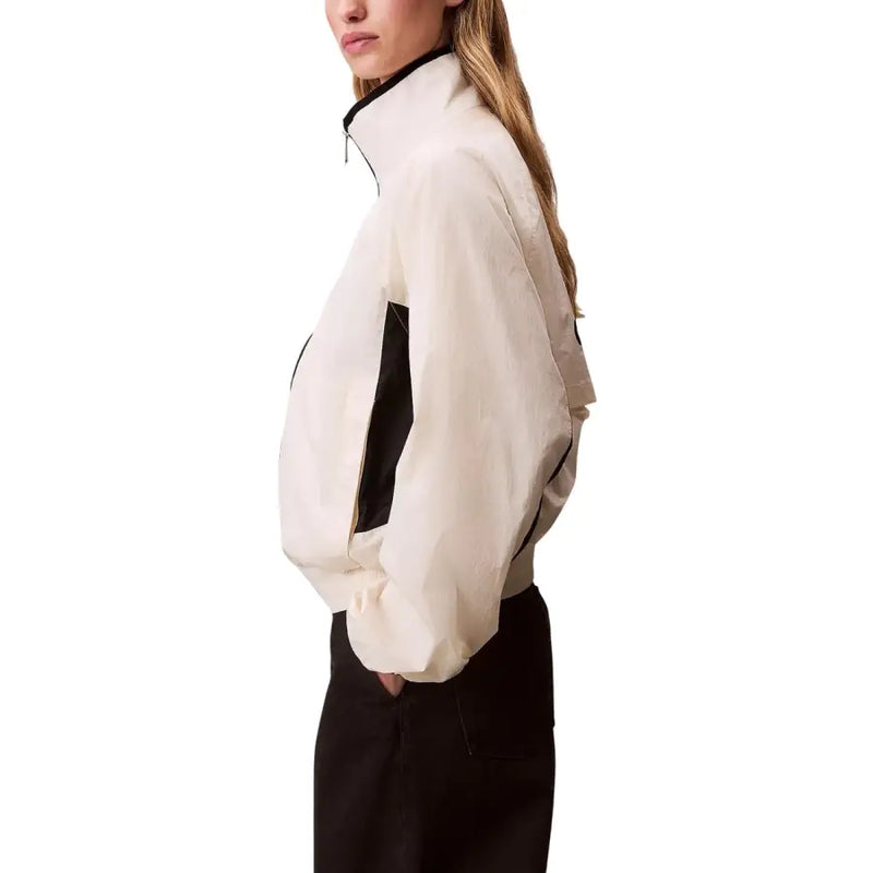 Cream-colored bomber jacket with black contrast panels and zipper details from calvin klein jeans women white turtleneck blazer collection